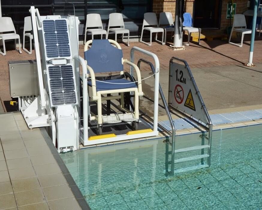 Disability access lift for swimming pool powered by solar